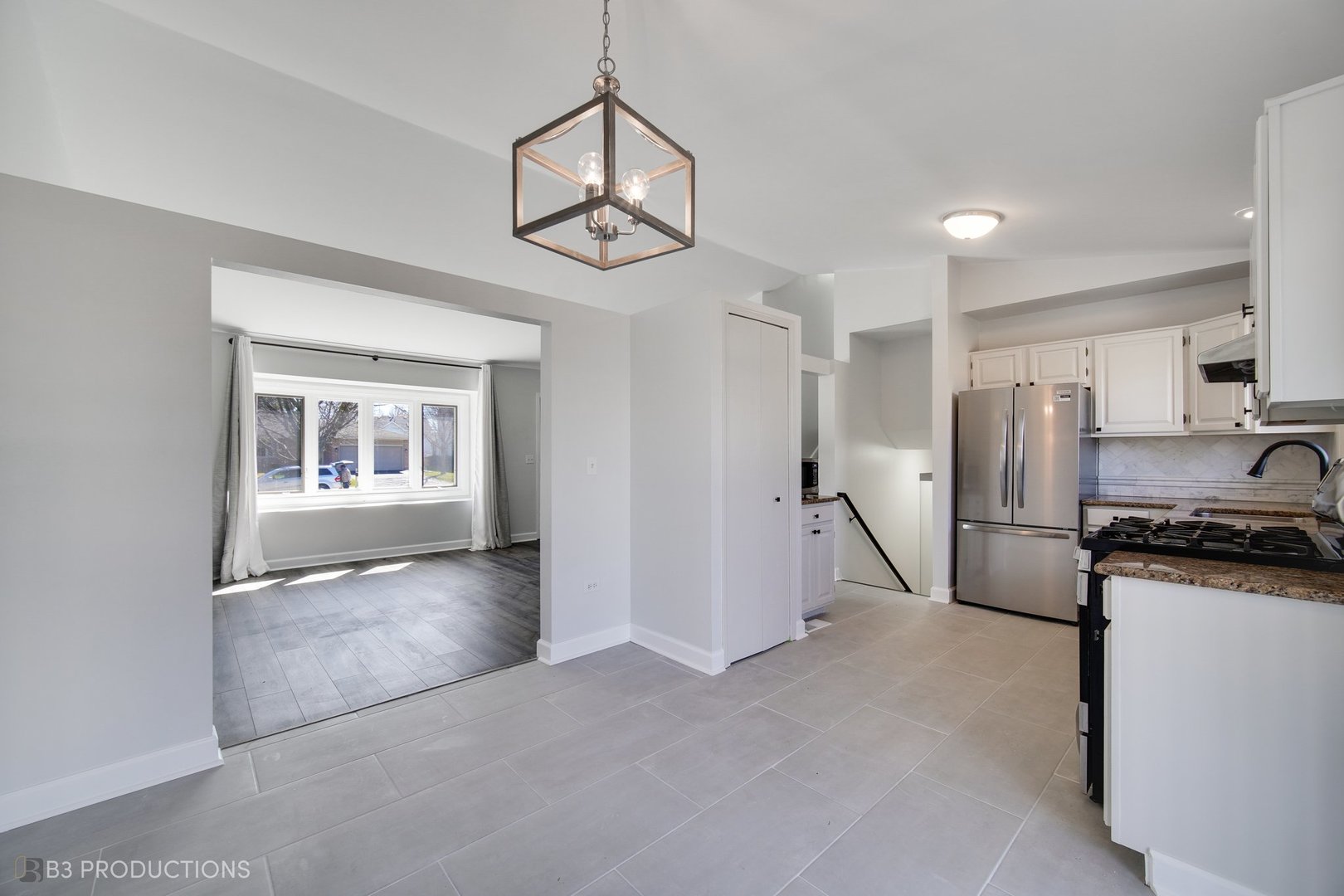 1722 Red Bud Road Bolingbrook, IL 60490 - Photo 6 of 29 a view of a kitchen with a sink and refrigerator