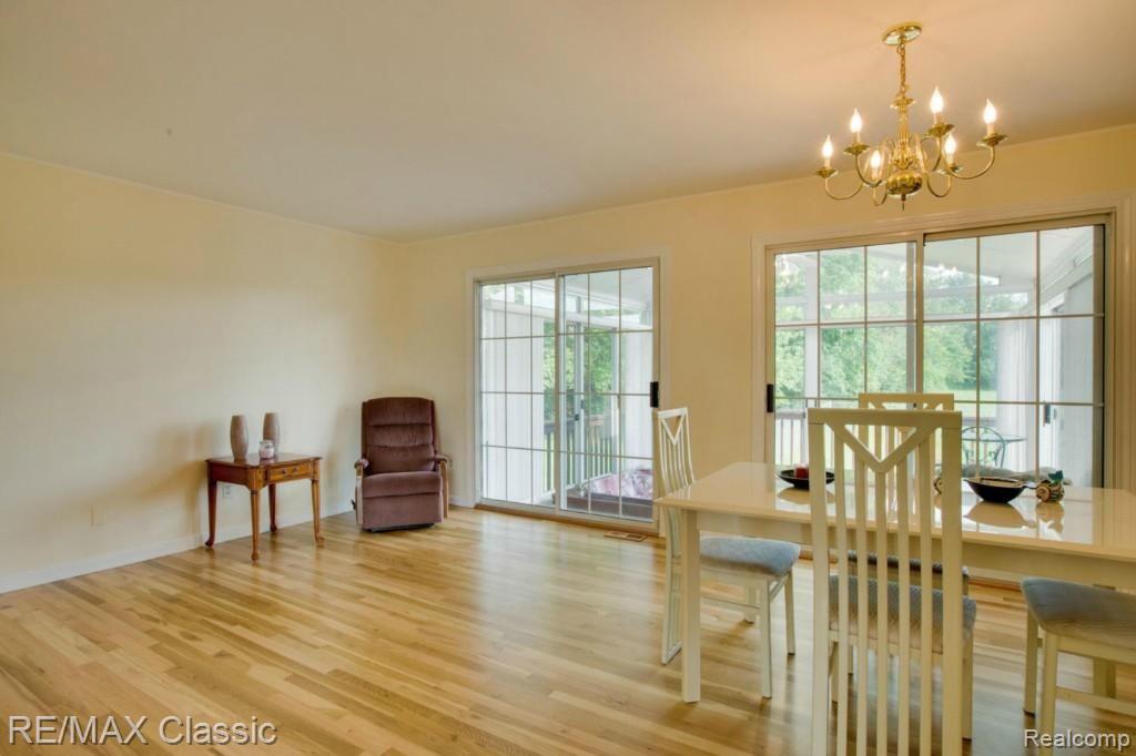 50821 Geddes Road Canton, MI 48188 - Photo 17 of 26 Sitting area with access to the sunroom.