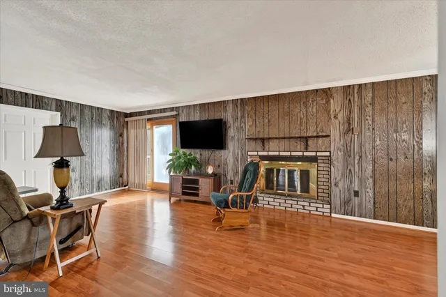 a kitchen with cabinets appliances and a sink