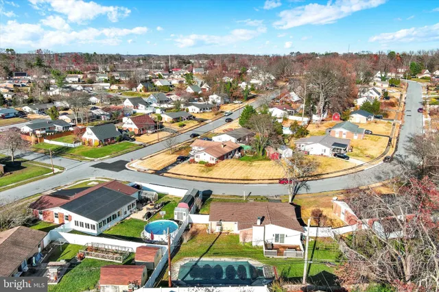 a view of swimming pool with a patio