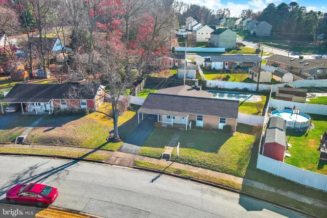 a view of swimming pool with outdoor seating