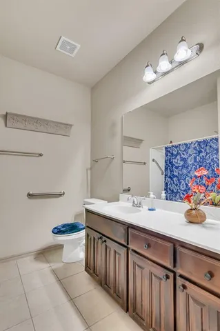 a view of a porch with furniture and a yard
