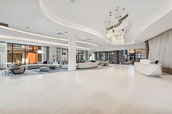 a dining room with wooden floor and glass door