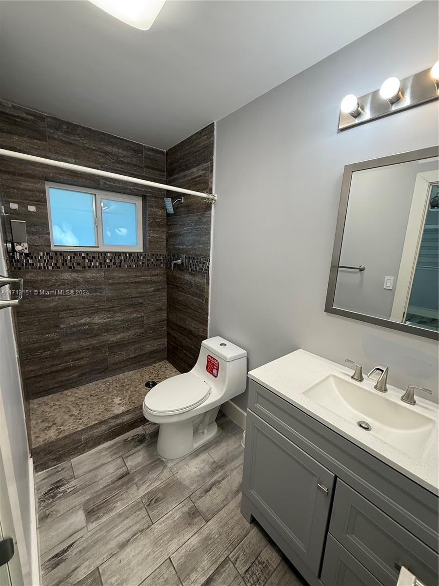 Fairway Estates Miami, FL 33157 - Photo 18 of 34 a bathroom with a sink toilet and shower