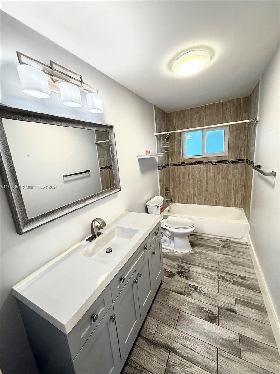 Fairway Estates Miami, FL 33157 - Photo 21 of 34 a bathroom with a sink and a mirror