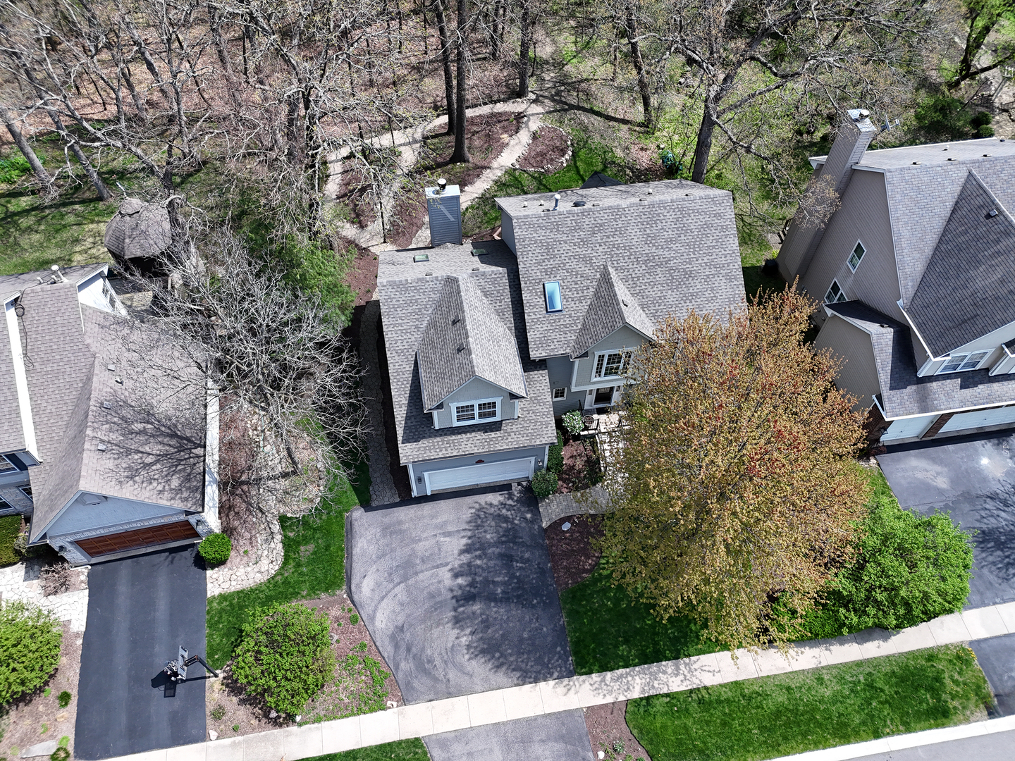 718 Barberry Trail Fox River Grove, IL 60021 - Photo 1 of 37 an aerial view of a house with a yard and large tree