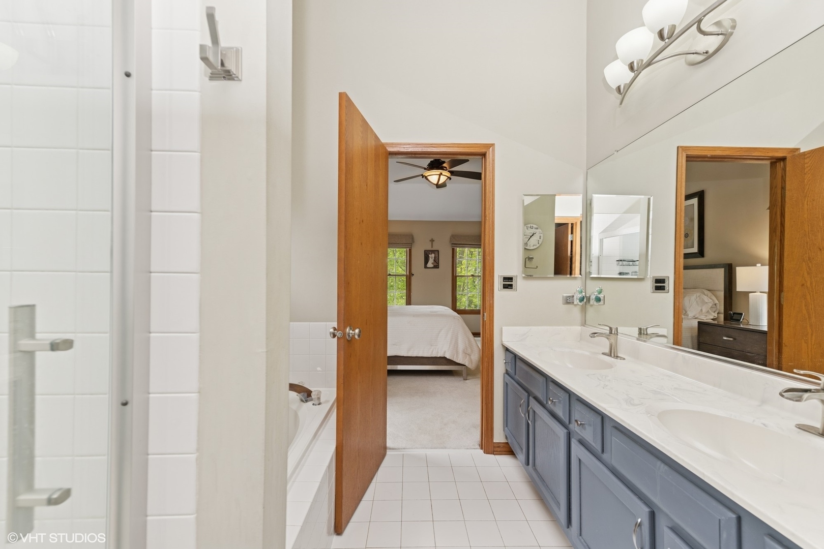 718 Barberry Trail Fox River Grove, IL 60021 - Photo 15 of 37 a bathroom with a double vanity sink and a mirror