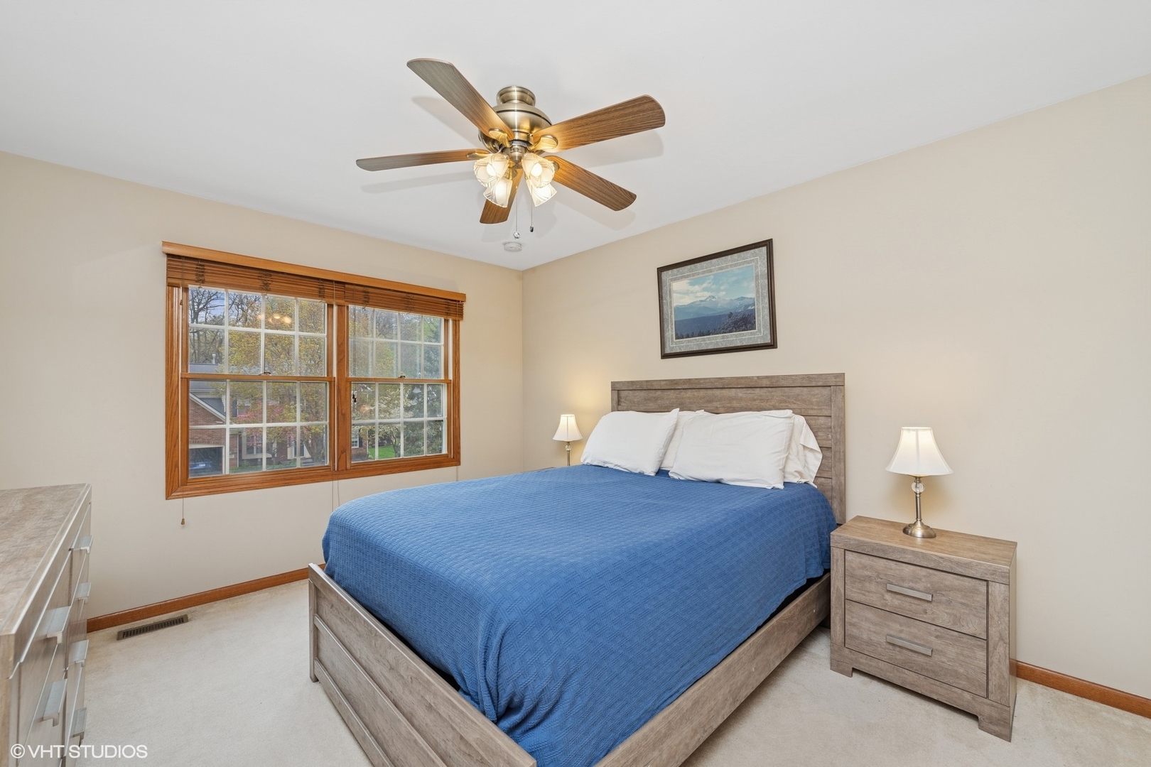 718 Barberry Trail Fox River Grove, IL 60021 - Photo 16 of 37 a bedroom with a large bed and a window