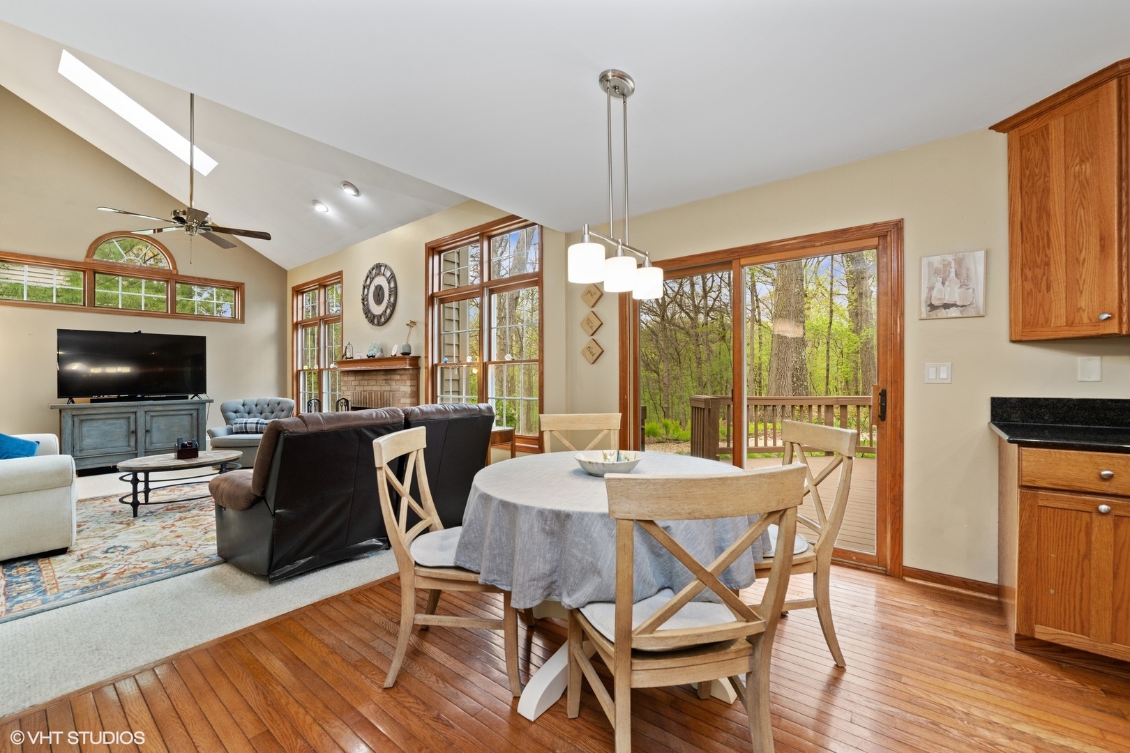 718 Barberry Trail Fox River Grove, IL 60021 - Photo 9 of 37 a view of a dining room with furniture window and wooden floor