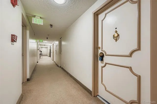 view of hall way with mirror