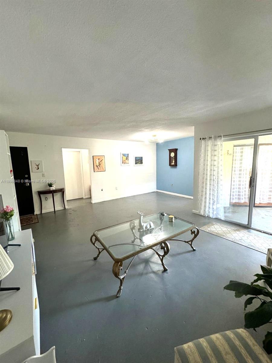 9030 Southwest 125th Avenue, Unit E210 Miami, FL 33186 - Photo 15 of 18 a room with furniture pool table and windows