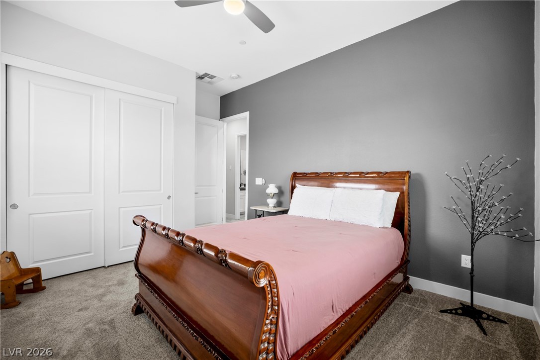 432 North Racetrack Road Henderson, NV 89015 - Photo 33 of 45 Bedroom with carpet flooring, a closet, and ceiling fan