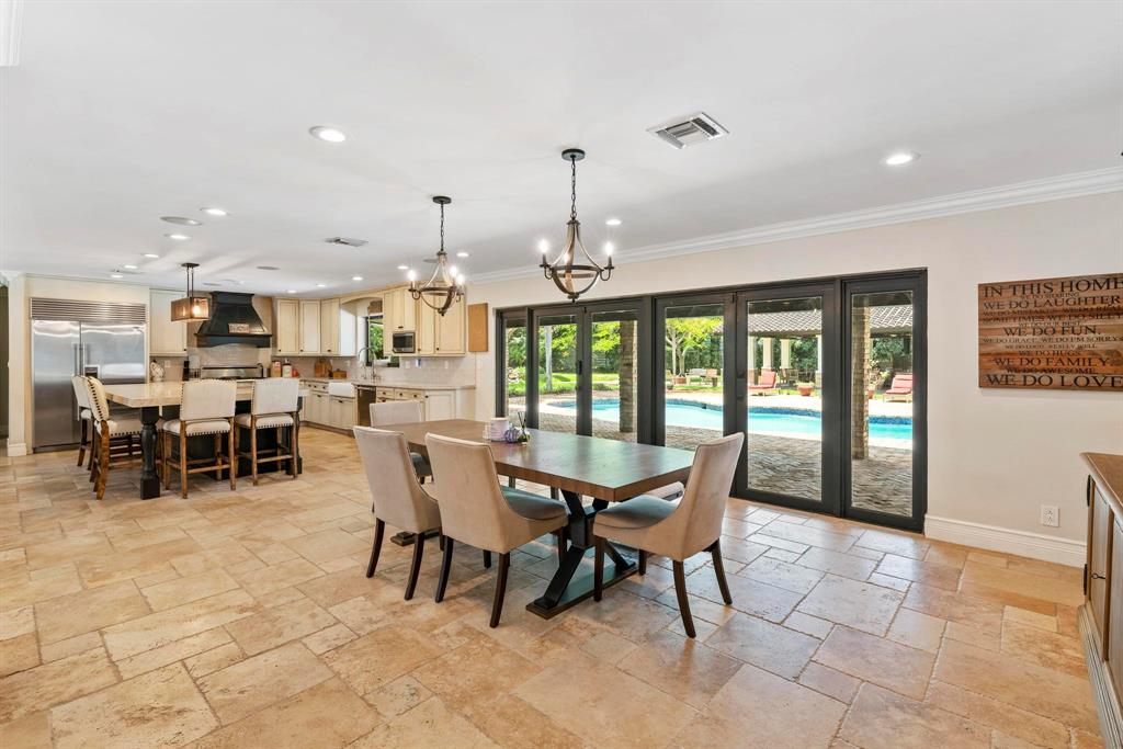 14701 Southwest 63rd Street Southwest Ranches, FL 33330 - Photo 27 of 75 a view of a dining room with furniture window and outside view