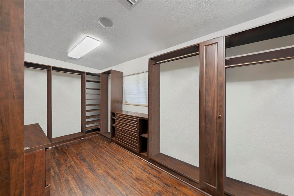 14701 Southwest 63rd Street Southwest Ranches, FL 33330 - Photo 41 of 75 a view of wooden floor and closet in a room