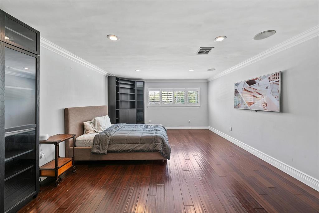 14701 Southwest 63rd Street Southwest Ranches, FL 33330 - Photo 44 of 75 a bedroom with a bed and a window