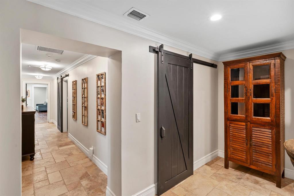 14701 Southwest 63rd Street Southwest Ranches, FL 33330 - Photo 55 of 75 a view of a hallway with wooden shelves