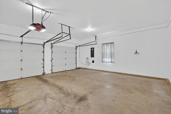 a picture of a bathroom with a shower