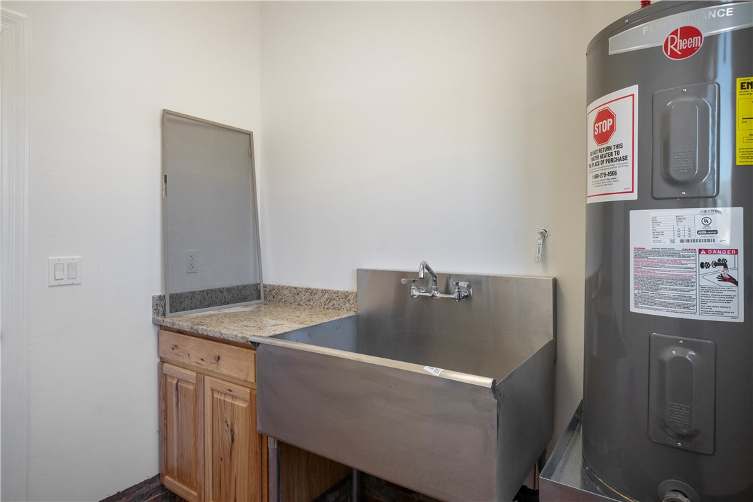 3328 Mobile Road Golden Valley, AZ 86413 - Photo 18 of 46 Kitchen with water heater and light countertops