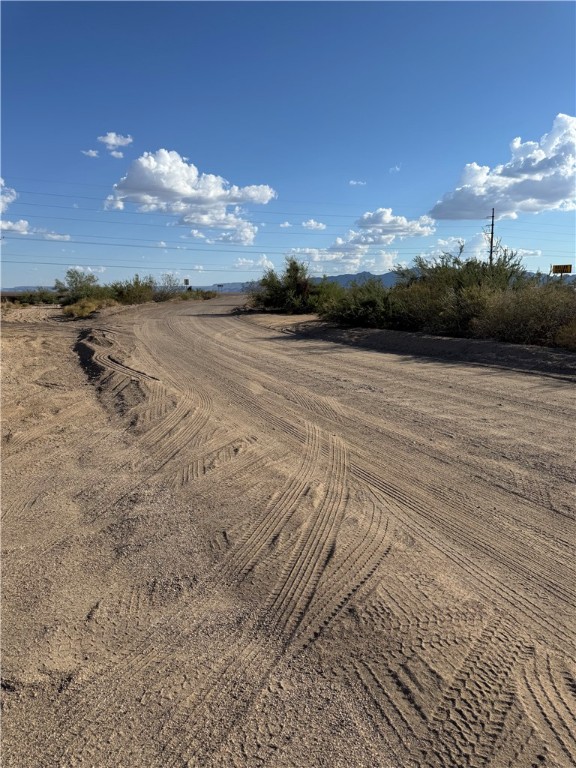 3328 Mobile Road Golden Valley, AZ 86413 - Photo 41 of 46 View of dirt / gravel road with a rural view