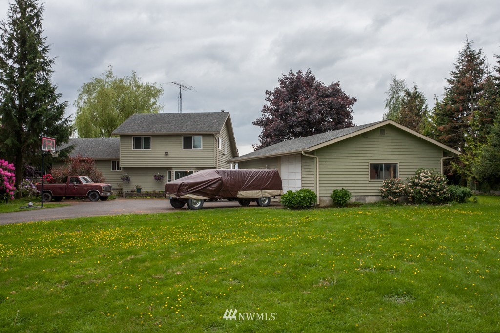 3359 Clearbrook Road Sumas, WA 98295 - Photo 1 of 25 a view of a house with a yard and sitting area
