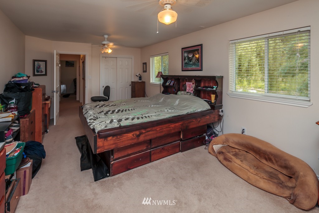 3359 Clearbrook Road Sumas, WA 98295 - Photo 13 of 25 a bed room with a bed and a mirror