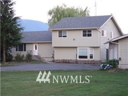 3359 Clearbrook Road Sumas, WA 98295 - Photo 24 of 25 a front view of a house with a garden