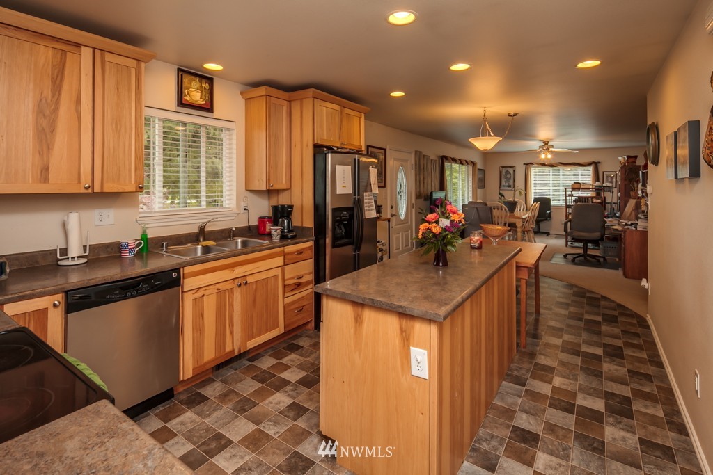 3359 Clearbrook Road Sumas, WA 98295 - Photo 6 of 25 a kitchen with stainless steel appliances granite countertop a sink and cabinets