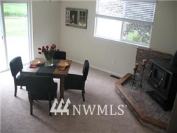 3359 Clearbrook Road Sumas, WA 98295 - Photo 8 of 25 a view of a dining room with furniture window and outside view