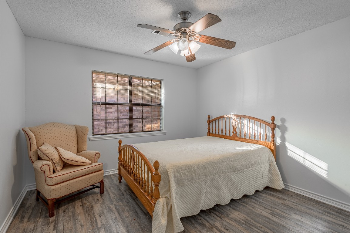 1 Cottonwood Trinity, TX 75862 - Photo 15 of 29 a bedroom with a bed and a couch