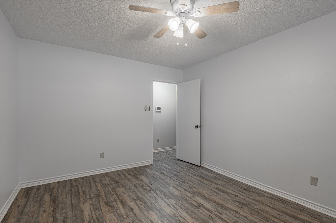 1 Cottonwood Trinity, TX 75862 - Photo 18 of 29 wooden floor in an empty room