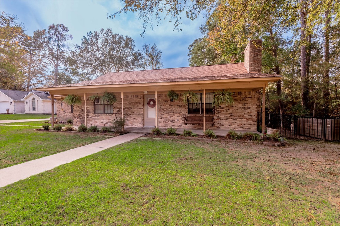 1 Cottonwood Trinity, TX 75862 - Photo 20 of 29 a view of a house with backyard and porch
