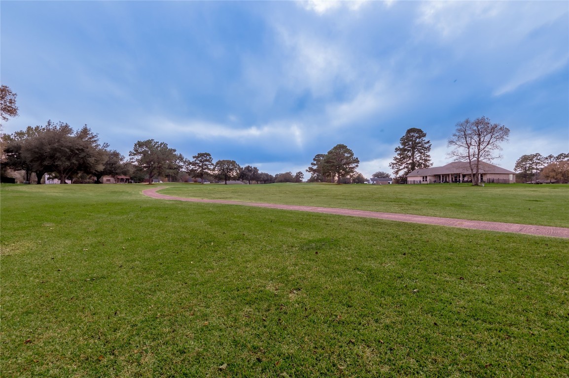 1 Cottonwood Trinity, TX 75862 - Photo 25 of 29 a view of a golf course with a garden