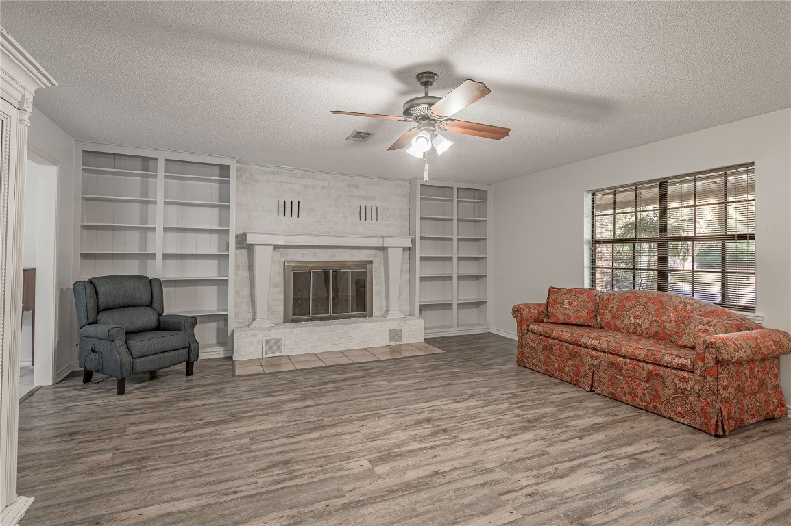 1 Cottonwood Trinity, TX 75862 - Photo 5 of 29 a living room with furniture and a fireplace