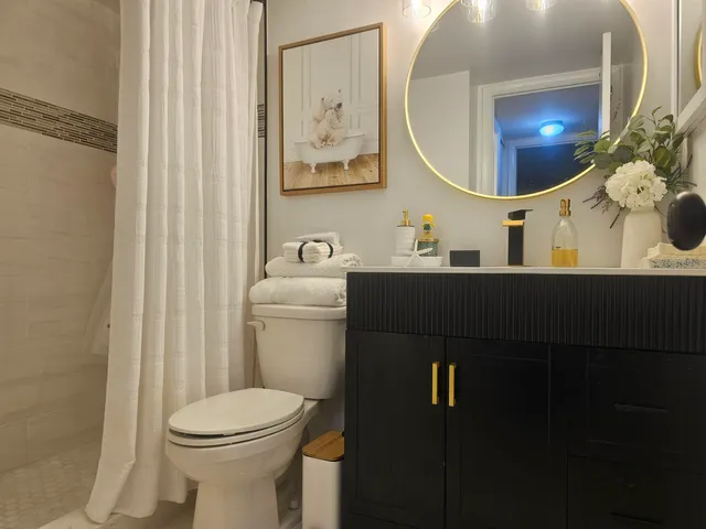 a bed room with a bed and a window