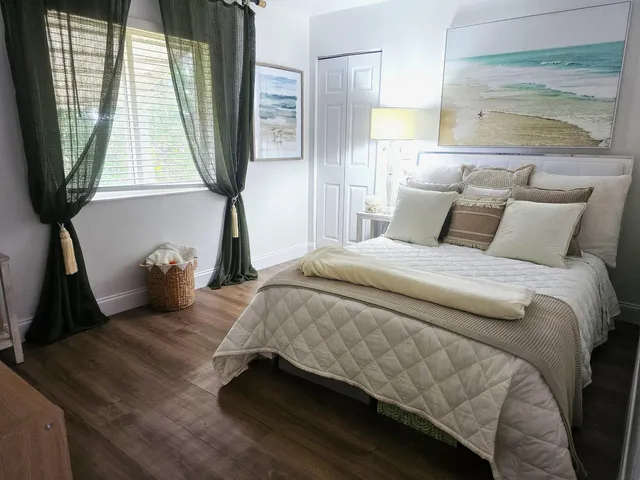 a view of a porch with furniture and floor