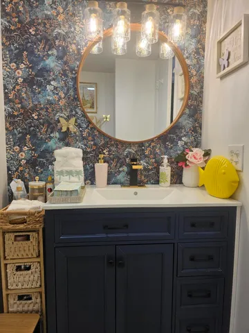 a view of a patio with table and chairs