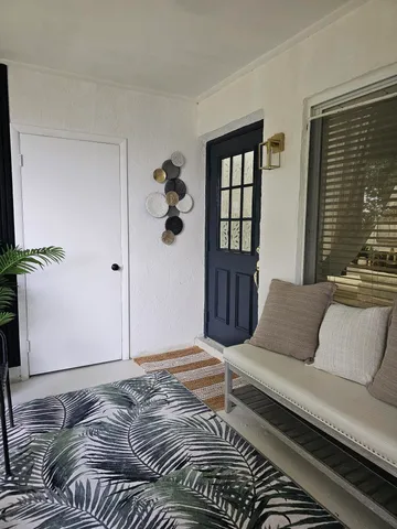 a view of kitchen with wooden floor