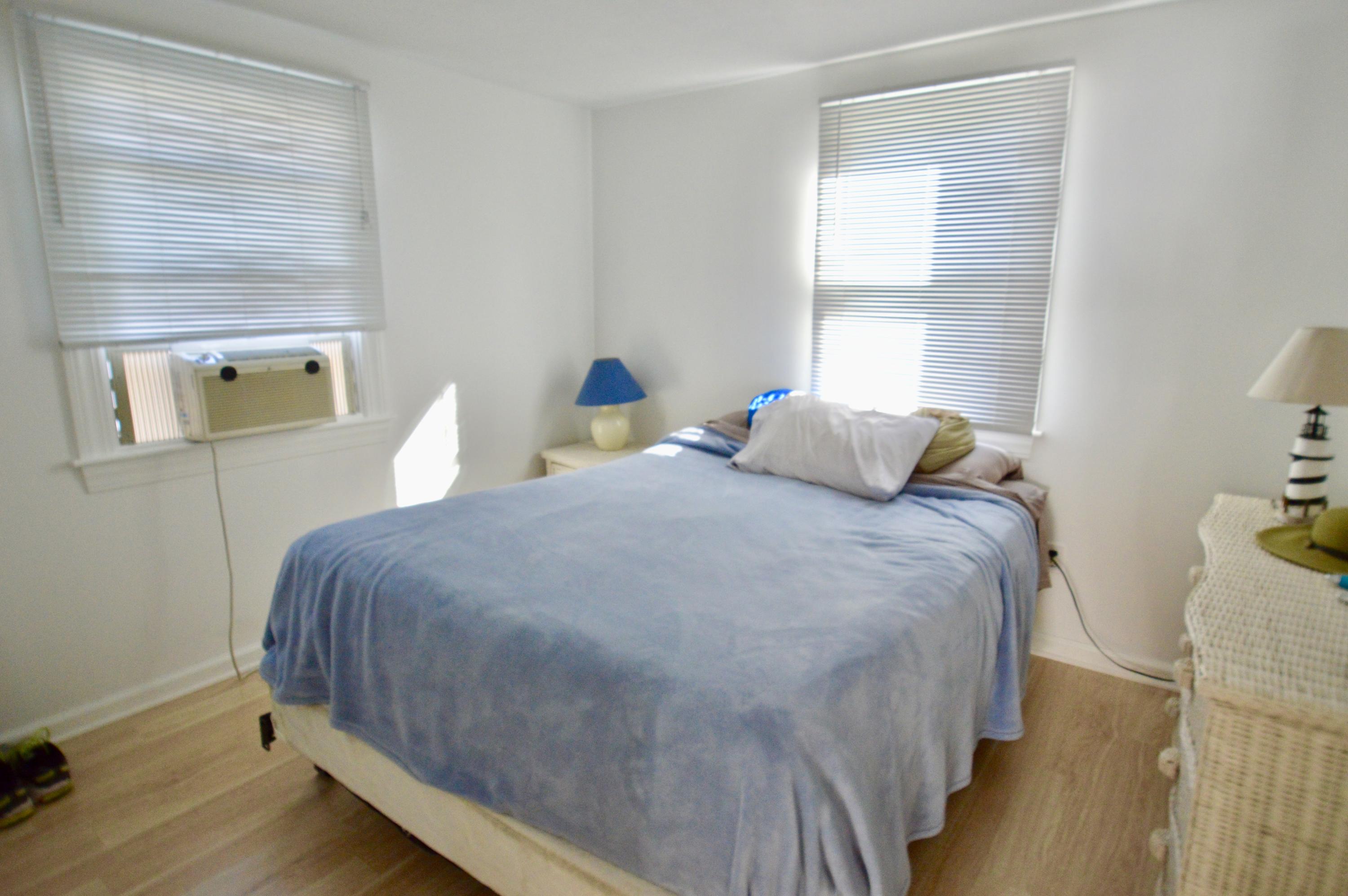 72 Bay View Road Barnstable, MA 02630 - Photo 9 of 18 a bedroom with bed and window