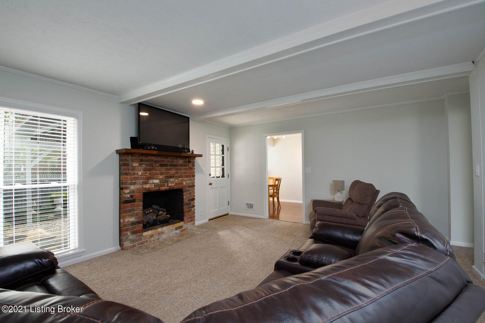 315 Moser Road Louisville, KY 40243 - Photo 9 of 39 Family Room has a window overlooking rear yard and door directly to back yard