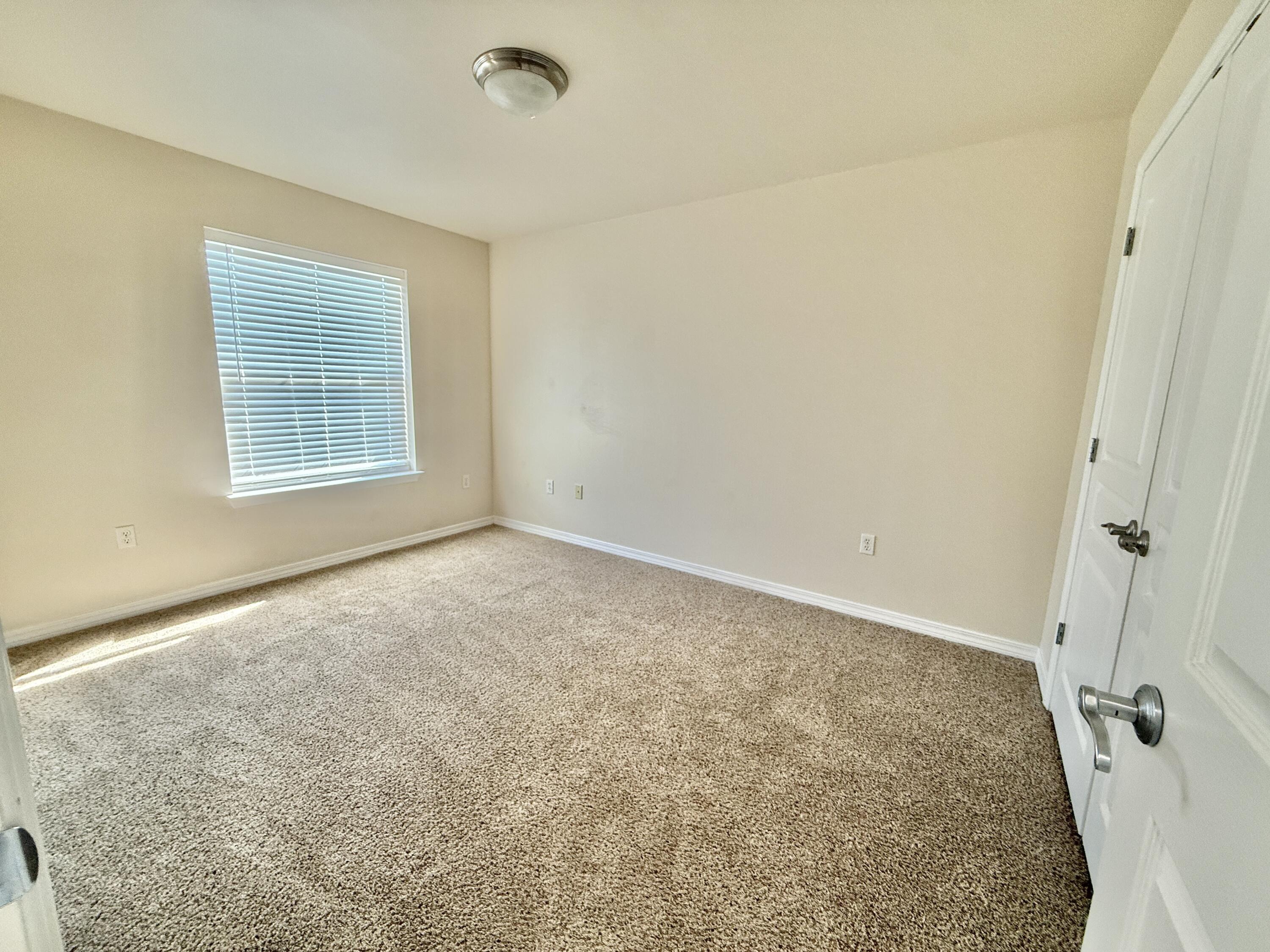 197 Hackberry Way Santa Rosa Beach, FL 32459 - Photo 21 of 26 an empty room with windows