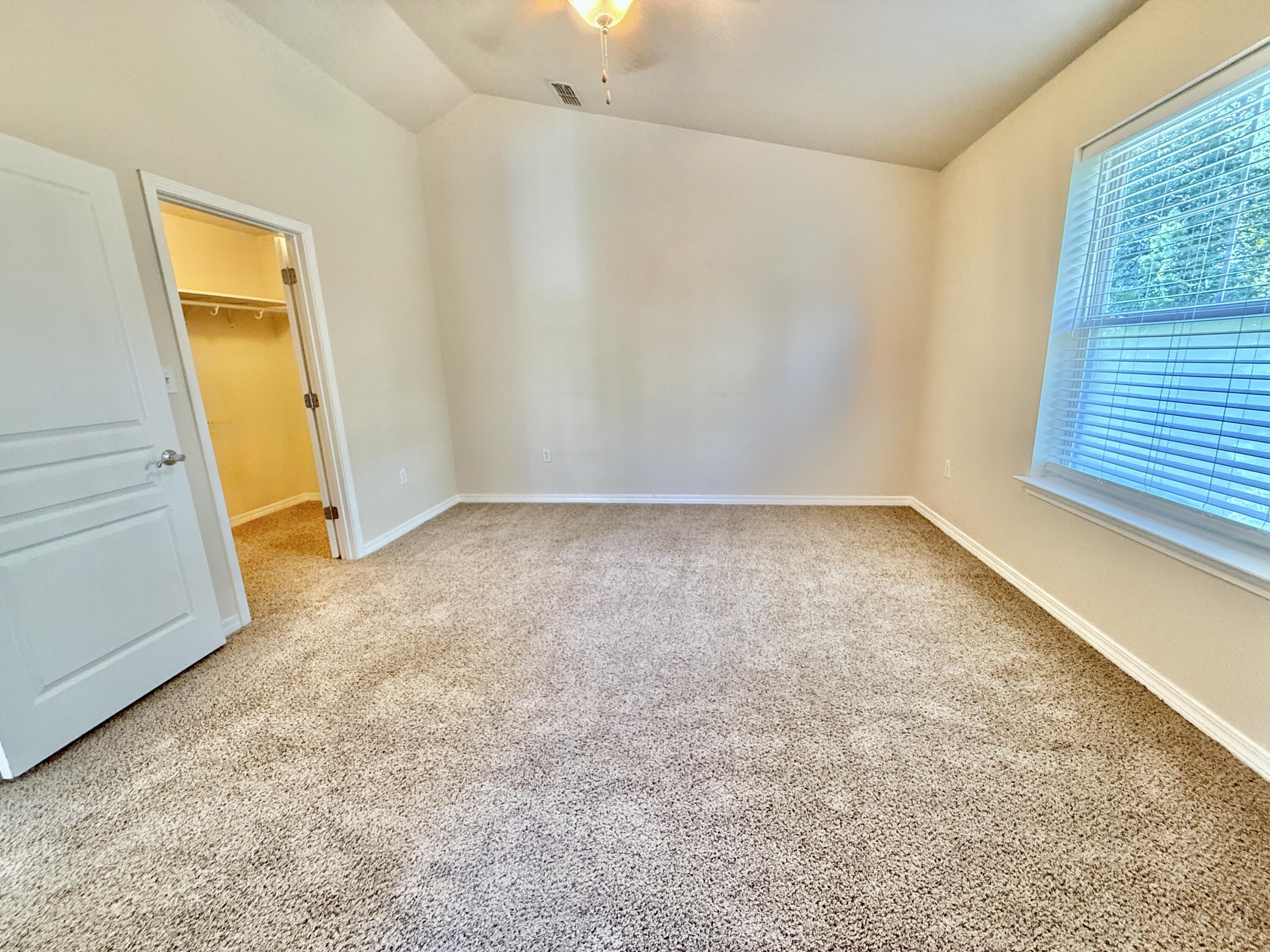 197 Hackberry Way Santa Rosa Beach, FL 32459 - Photo 22 of 26 an empty room with a window