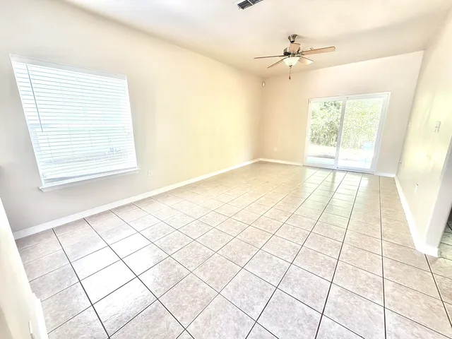 a view of an empty room and window
