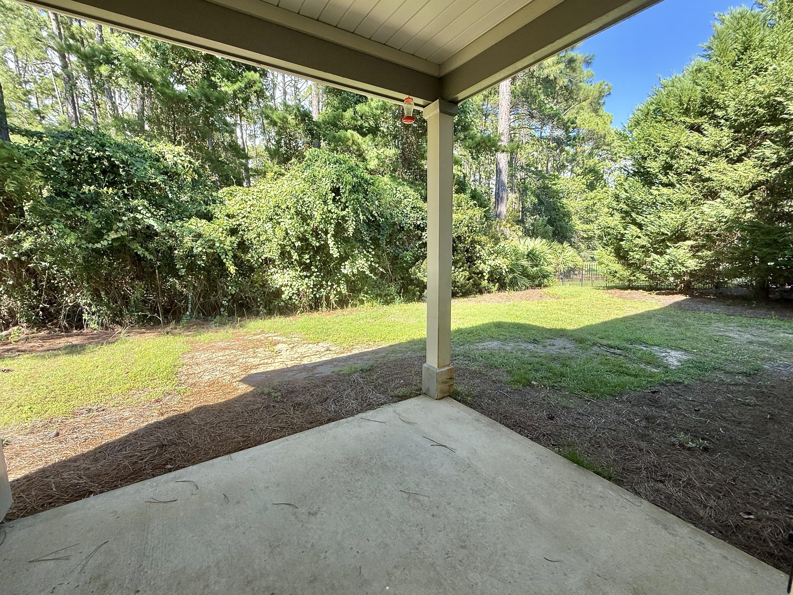 197 Hackberry Way Santa Rosa Beach, FL 32459 - Photo 9 of 26 a view of a yard with an outdoor space