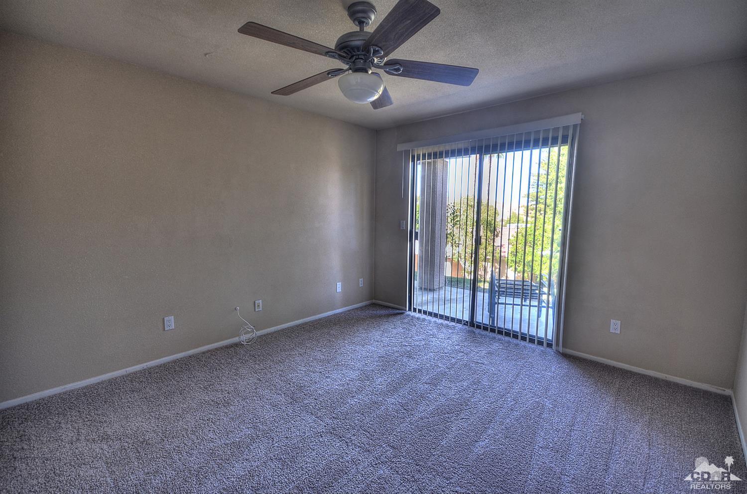 72386 Ridgecrest Lane Palm Desert, CA 92260 - Photo 20 of 38 a view of an empty room with a window