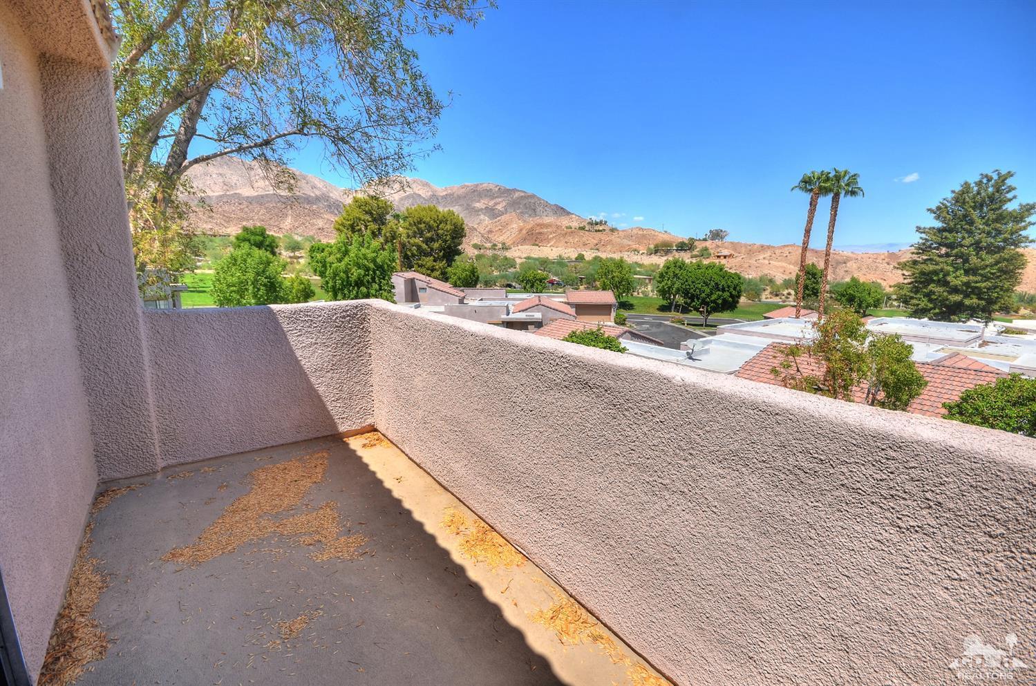 72386 Ridgecrest Lane Palm Desert, CA 92260 - Photo 30 of 38 a view of balcony with furniture and city view