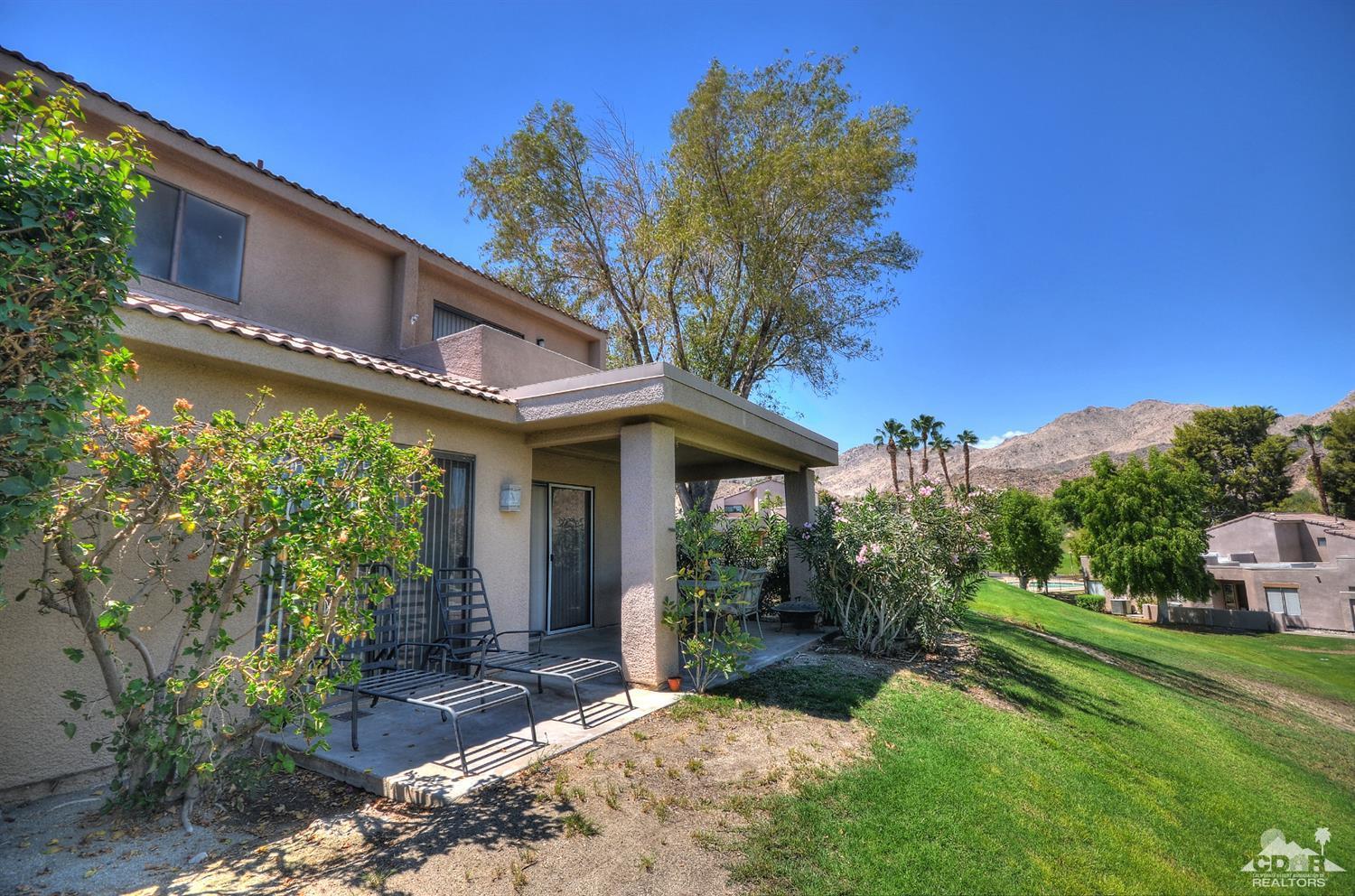 72386 Ridgecrest Lane Palm Desert, CA 92260 - Photo 34 of 38 a view of a house with a yard