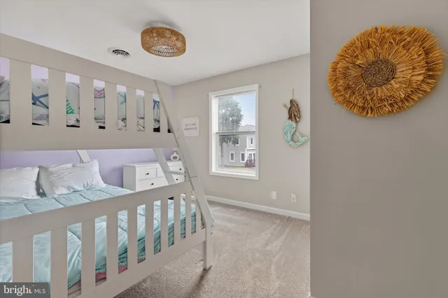 a view of a room that has a window and kitchen countertops