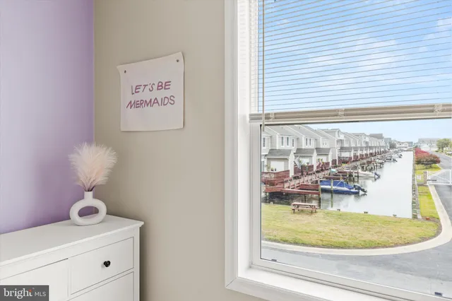 a living room with furniture and baby couch
