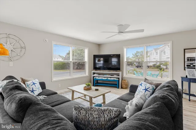 a kitchen with stainless steel appliances a refrigerator and a stove top oven