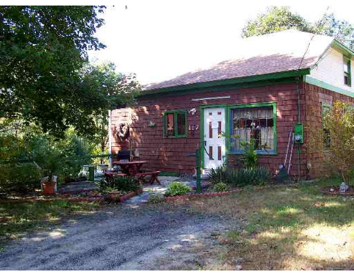 117 West Orange Road Orange, MA 01364 - Photo 1 of 1 a front view of a house with garden